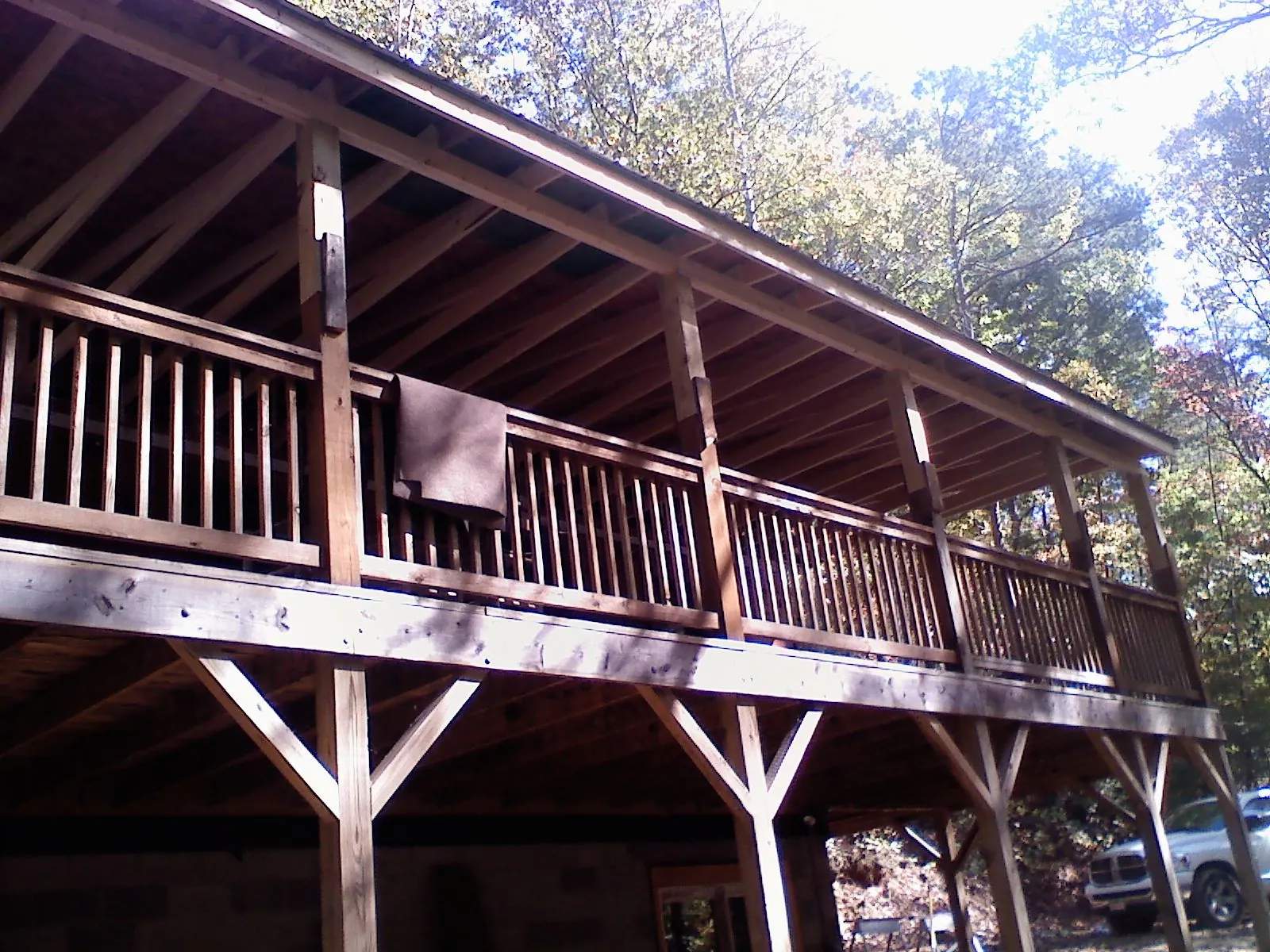 Timber framing under a new elevated porch and deck — Roof Leak Repair in Woolwich by Roofing Brothers